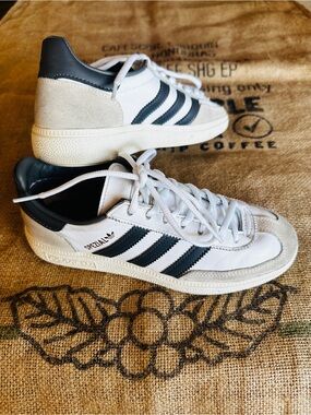 ADIDAS Originals Handball Spezial sneakers in cloud white and grey.